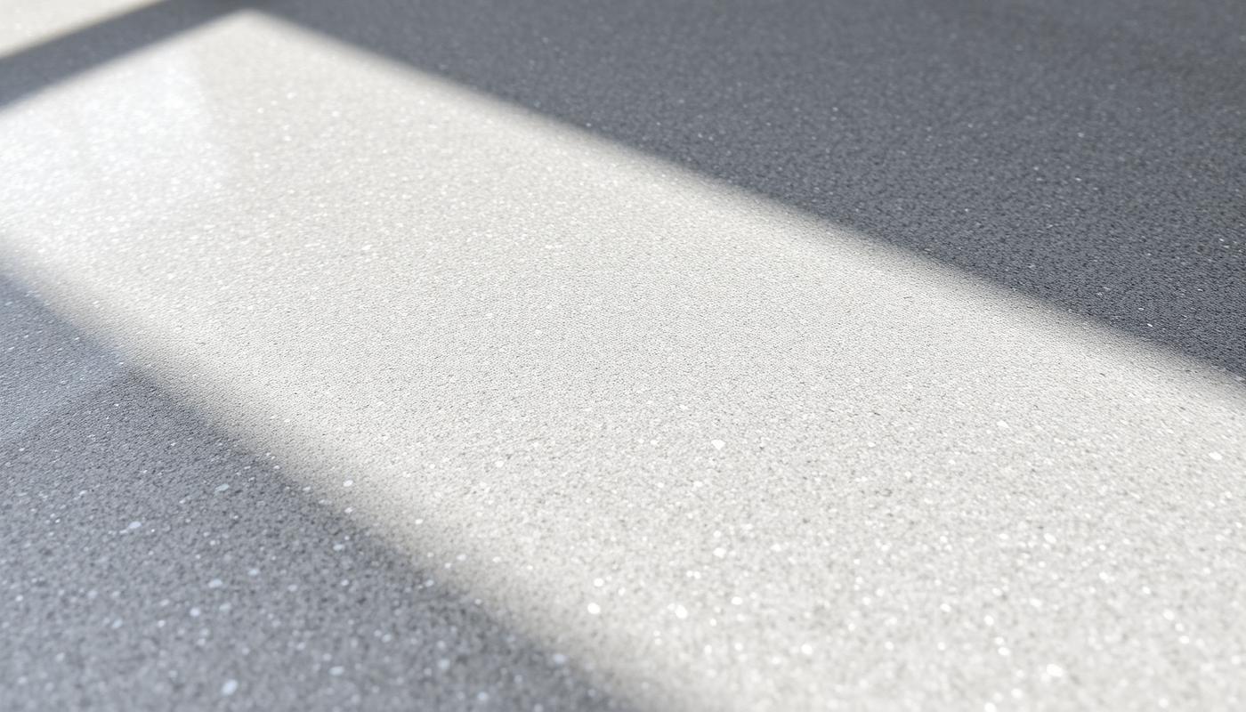 Détail d'une surface époxy grise satinée avec paillettes